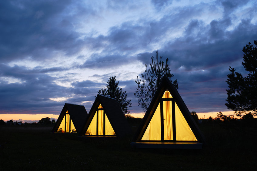 3 Wigwam tents against a night sky.