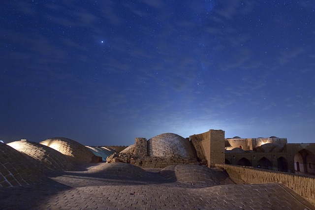 Buildings in the desert at night.
